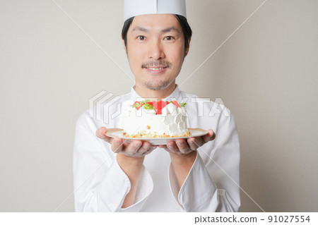 Pastry chef and cake Pastry chef and cake 91027554