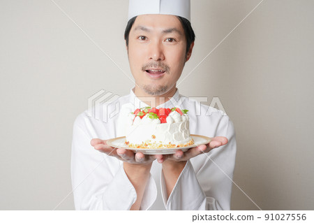 Pastry chef and cake Pastry chef and cake 91027556