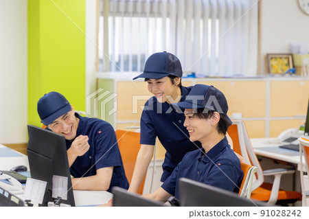 People working in the logistics / transportation industry office People working in the logistics / transportation industry office 91028242