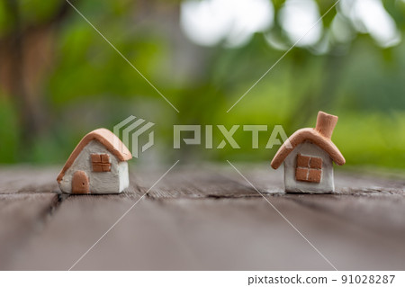 Two cute houses of unglazed pottery 91028287