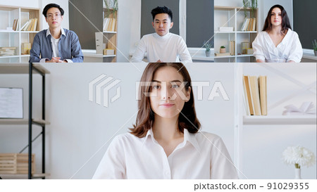 Group video call. Business teleconference. International cooperation. Screenshot of diverse professional team working online at virtual office. Group video call. Business teleconference. International cooperation. Screenshot of diverse professional team working online at virtual office. 91029355