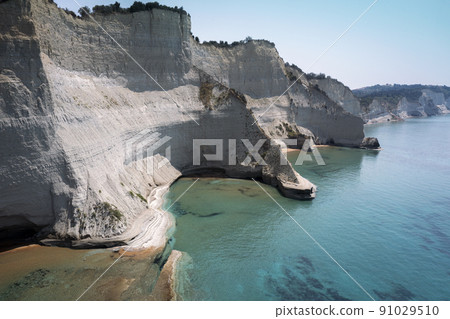 sheer white cliffs of Cape Drastis near Peroulades 91029510