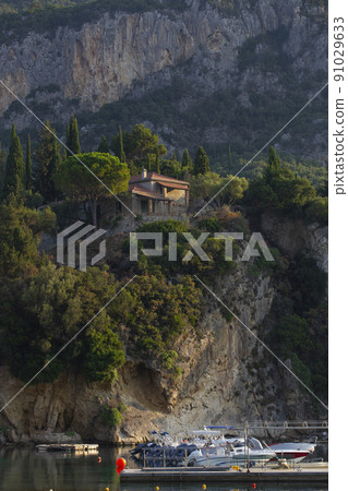 boats in the bay of Paleokastritsa at dawn 91029633