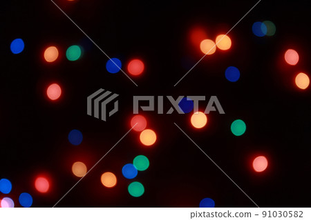 Abstract bokeh background of round Christmaslight and celebrations. 91030582
