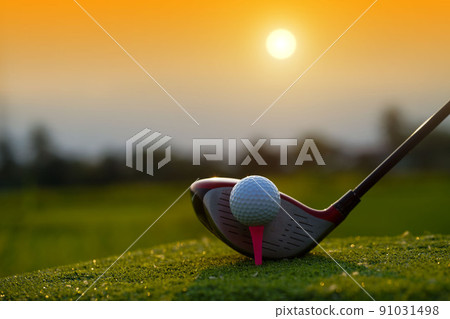 Golf balls on the golf course with golf clubs ready for golf in the first short. Golf balls on the golf course with golf clubs ready for golf in the first short. 91031498