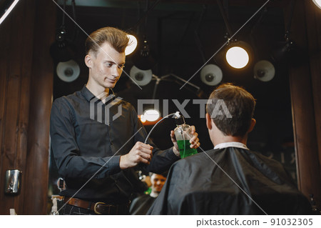 Man work with hair. Hairdresser with a client. Man work with hair. Hairdresser with a client. 91032305