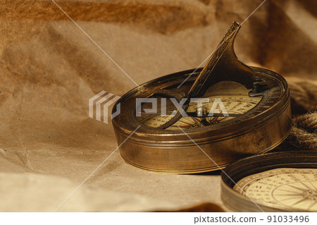 Ship rope and compass on wooden background 91033496