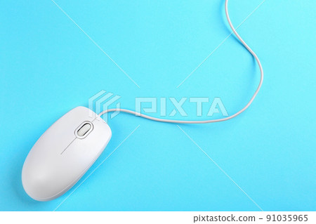 Modern wired mouse on light blue background, top view Modern wired mouse on light blue background, top view 91035965