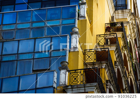Exterior of old apartment building with many balconies Exterior of old apartment building with many balconies 91036225