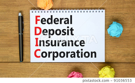 FDIC federal deposit insurance corporation symbol. Concept words FDIC federal deposit insurance corporation on note on white background. Business FDIC federal deposit insurance corporation concept. FDIC federal deposit insurance corporation symbol. Concept words FDIC federal deposit insurance corporation on note on white background. Business FDIC federal deposit insurance corporation concept. 91036553
