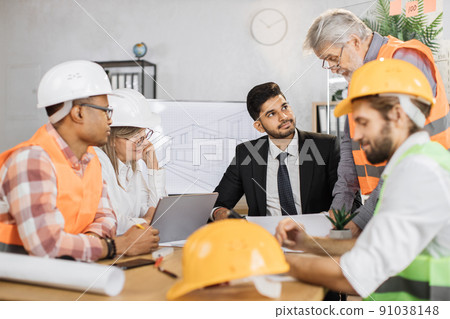 Focuse on protective hardhat. 91038148