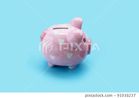 Pinggy bank on blue background. 91038237