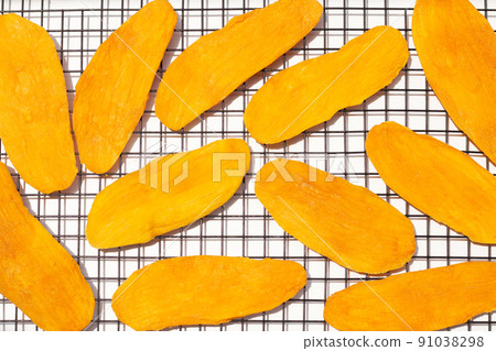 Dried mango on white background 91038298
