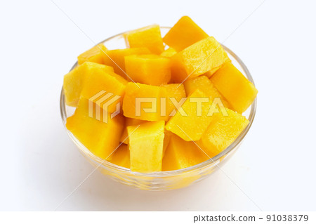 Yellow mango cube slices on white background. 91038379