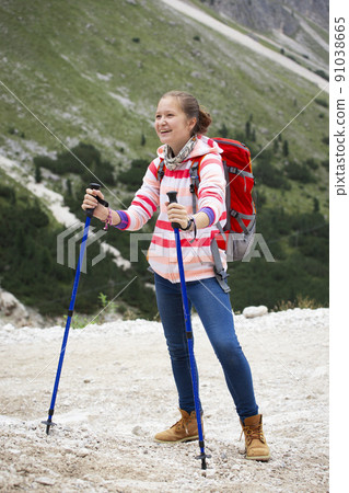 tourist girl at the Dolomites tourist girl at the Dolomites 91038665