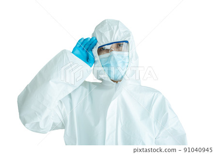 Unrecognizable specialist doctor dress up a medical PPE suit before working in hospital. Personal Protection Equipment or PPE suit use for coronavirus - COVID-19 pandemic disease. Unrecognizable specialist doctor dress up a medical PPE suit before working in hospital. Personal Protection Equipment or PPE suit use for coronavirus - COVID-19 pandemic disease. 91040945