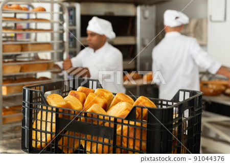 formed bread in baking tray in bakery formed bread in baking tray in bakery 91044376