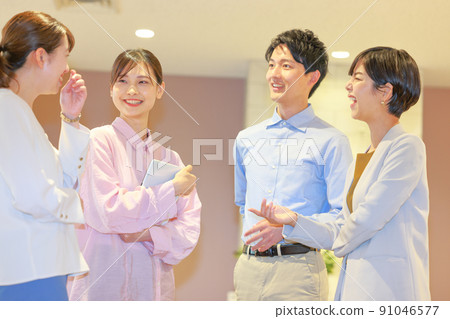 A standing meeting with four creators laughing constantly 1 91046577