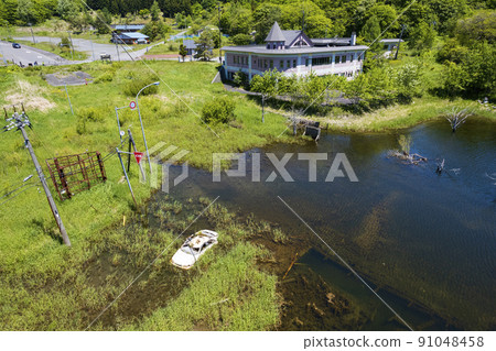 Aerial view of Toya Nishiyama foot crater (white car sunk in Nishishinyama swamp) Aerial view of Toya Nishiyama foot crater (white car sunk in Nishishinyama swamp) 91048458