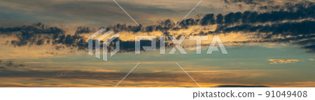 Evening sky with dramatic clouds over the sea. Dramatic sunset over the sea 91049408