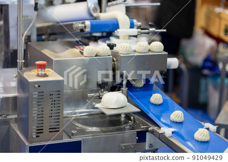 automatic food maker machine in food industry factory, Baozi Chinese bun wrap maker machine. 91049429