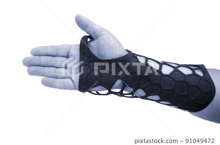 Orthopedic plastic prosthesis printed on powder 3D printer on hand. Isolated on white background. Gypsum close-up. Multi Jet Fusion MJF 3D printing technology. Modern progressive additive technology Orthopedic plastic prosthesis printed on powder 3D printer on hand. Isolated on white background. Gypsum close-up. Multi Jet Fusion MJF 3D printing technology. Modern progressive additive technology 91049472