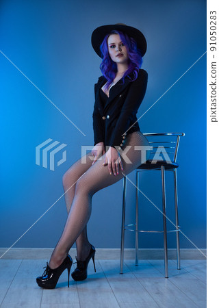 sexy girl in a fashionable jacket and hat poses erotically in her underwear sexy girl in a fashionable jacket and hat poses erotically in her underwear 91050283