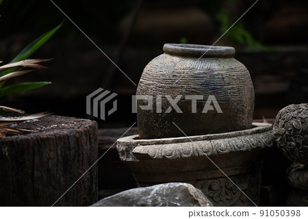 A collection of pottery with light coming from the side 91050398