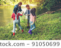 Group of kids and teacher school volunteer charity environment. 91050699