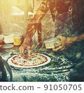 hand Chef preparing spread cheese on pizza on marble table 91050705