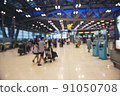 Traveler at airport terminal blur background 91050708