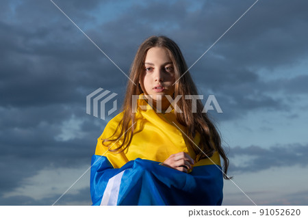 patriotic teen ukrainian girl with national flag of independent ukraine patriotic teen ukrainian girl with national flag of independent ukraine 91052620
