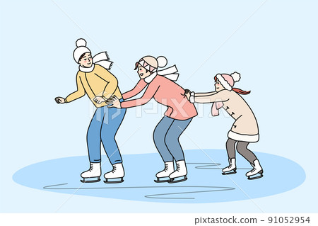 Family skating on ice rink together Family skating on ice rink together 91052954
