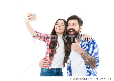 Family selfie. Happy father and daughter take selfie with smartphone. Smile of approval Family selfie. Happy father and daughter take selfie with smartphone. Smile of approval 91053843
