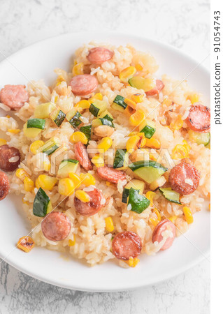 Fried rice with corn and zucchini Fried rice with corn and zucchini 91054743