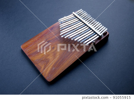 Traditional wooden kalimba isolated on black 91055915