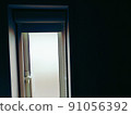 A small window with clear light and shadow 91056392