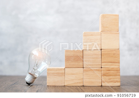 Lightbulb and wood block stack of building with business idea, creative, thinking goal, strategy and innovation concept Lightbulb and wood block stack of building with business idea, creative, thinking goal, strategy and innovation concept 91056719