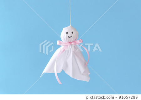 Teru Teru Bozu. A doll with a wish for the rain to rise. Light blue background Teru Teru Bozu. A doll with a wish for the rain to rise. Light blue background 91057289
