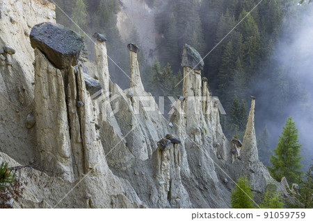 Earth pyramids of Platten (Erdpyramiden - Piramidi di Plata) near Percha and Bruneck,  South Tyrol, Italy 91059759