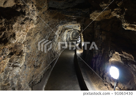 Cave with stalactites and stalagmites. The geological formation of Punkva Caves Cave with stalactites and stalagmites. The geological formation of Punkva Caves 91063430