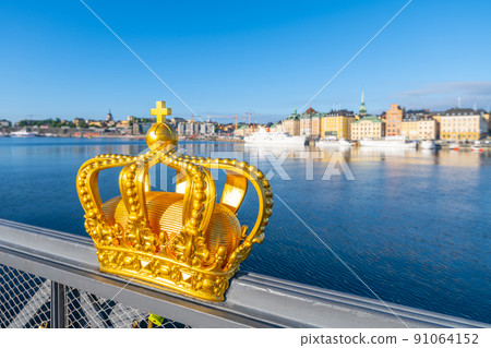 Golden Crown of Skeppsholmen Bridge in Stockholm Golden Crown of Skeppsholmen Bridge in Stockholm 91064152