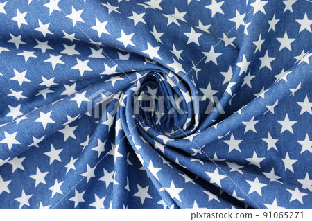 Blue crumpled fabric with white stars texture background 91065271