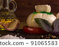A beautiful composition with burata cheese in a rustic style 91065583