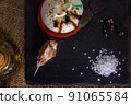 A beautiful composition with burata cheese in a rustic style 91065584