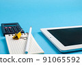 workspace top view. office Desk with office supplies, calculator and tablet computer. side view blue background 91065592