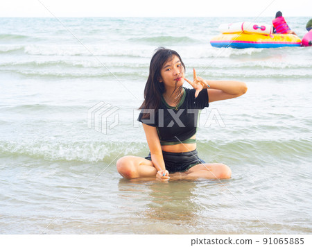 Little girl playing in the at sea happy joyful. (travel and tourism concept) Little girl playing in the at sea happy joyful. (travel and tourism concept) 91065885