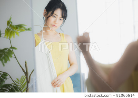 Woman worried about clothes Woman worried about clothes 91066614