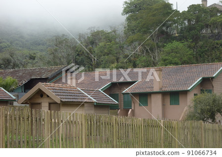 historic village of Paranapiacaba under fog. old railway station. Santo Andre, Brazil historic village of Paranapiacaba under fog. old railway station. Santo Andre, Brazil 91066734