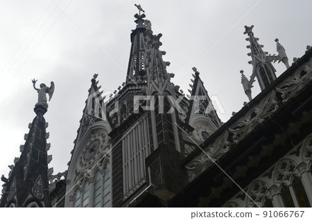 The sanctuary of Las Lajas, gothic style catholic church jammed in the canyon river. Ipiales, Colombia The sanctuary of Las Lajas, gothic style catholic church jammed in the canyon river. Ipiales, Colombia 91066767